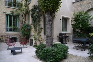 Vonkajšia záhrada v ubytovaní La Villa d'Auteuil, Paris 16, rénovée