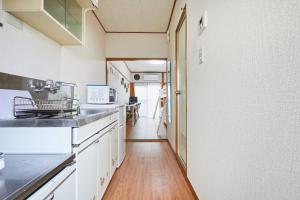 Η κουζίνα ή μικρή κουζίνα στο Yamato Heights YH27