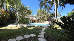 Bazén v ubytování COLIVER - COLIVING A LA RÉUNION nebo v jeho okolí
