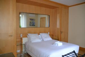 Posteľ alebo postele v izbe v ubytovaní La Villa d'Auteuil, Paris 16, rénovée