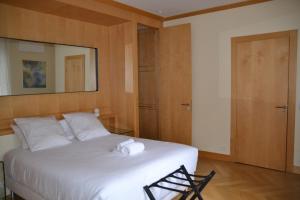 Posteľ alebo postele v izbe v ubytovaní La Villa d'Auteuil, Paris 16, rénovée