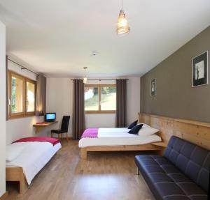 Voodi või voodid majutusasutuse Helvetia hotel toas