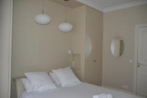 Posteľ alebo postele v izbe v ubytovaní La Villa d'Auteuil, Paris 16, rénovée