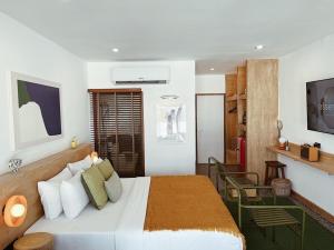 Postel nebo postele na pokoji v ubytování Rimtalay Resort Koh Larn