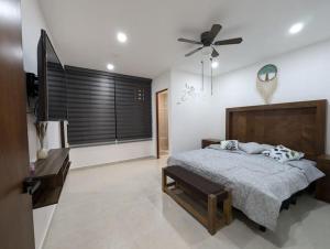 Postel nebo postele na pokoji v ubytování Residencia en Mérida, Yucatán