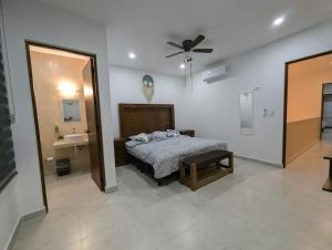 Postel nebo postele na pokoji v ubytování Residencia en Mérida, Yucatán