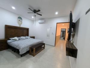 Postel nebo postele na pokoji v ubytování Residencia en Mérida, Yucatán