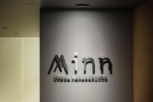大阪市にあるMinn 梅田中崎町の壁面の不正マーケティングの印 +19枚の写真