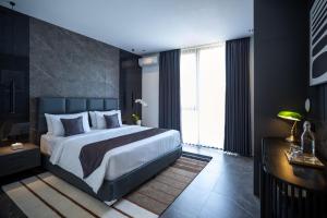 Postel nebo postele na pokoji v ubytování Umalas Creek Villas