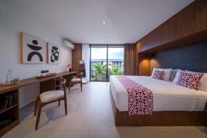 Postel nebo postele na pokoji v ubytování Umalas Creek Villas + 26 fotografií