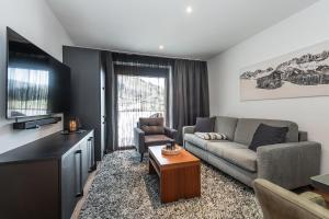 Istumisnurk majutusasutuses AlpenParks Hotel & Apartment Taxacher