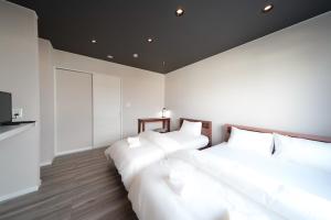 Gallery image of Glee Niseko LUX condo 羊蹄山一望 新築 駐車場完備 in Kutchan