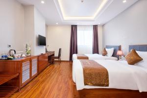 Postel nebo postele na pokoji v ubytování Mercury Apartment Danang + 37 fotografií