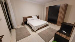 Ένα ή περισσότερα κρεβάτια σε δωμάτιο στο Dreamy residences at Madinaty مدينتي