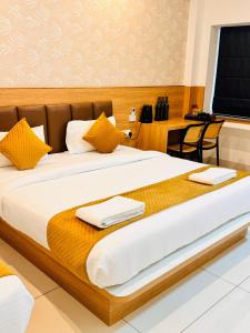 Postel nebo postele na pokoji v ubytování Bimba Hotels