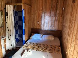 Letto o letti in una camera di Kribi-Lodge