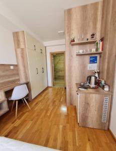 Kuchyň nebo kuchyňský kout v ubytování Bojana Apartment Penthouse