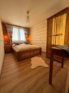 Posteľ alebo postele v izbe v ubytovaní Apartament Ślebodny Upłaz