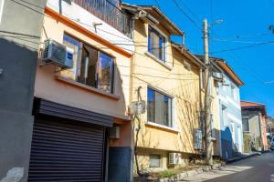 a building on the side of a street at Guest House Malusha in Gabrovo