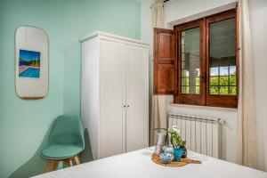 Posteľ alebo postele v izbe v ubytovaní Il Giardino Dei Limoni 8, Emma Villas