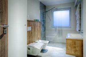 Kúpeľňa v ubytovaní Apartamenty Odlot + 9 fotografií