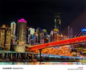 a night view of a city with a red bridge at Kaibu Courtyard Superior Apartment, Changjiang Cable Car Nanbin Road, Chongqing in Chongqing