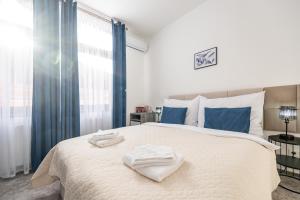 Postel nebo postele na pokoji v ubytování Hotel Litovel