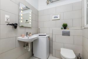 Kúpeľňa v ubytovaní Real Apartments Kertész II. + 7 fotografií