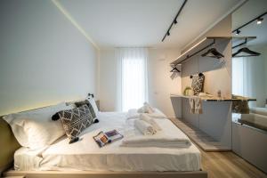 Postel nebo postele na pokoji v ubytování Residence Canova