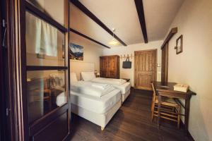 Postel nebo postele na pokoji v ubytování Albergo Locanda Mistral