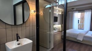 Voodi või voodid majutusasutuse Suncloud Hotel Koh Samet toas
