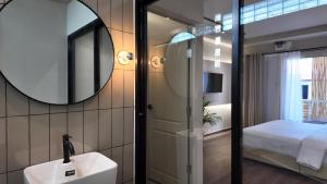 Voodi või voodid majutusasutuse Suncloud Hotel Koh Samet toas