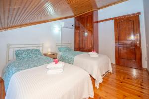 Postel nebo postele na pokoji v ubytování Villa Eleni Peritheia BY CorfuEscapes