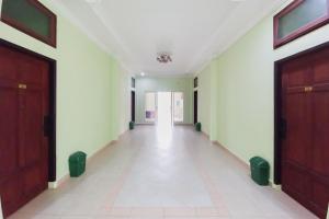 Fotografie z fotogalerie ubytování RedDoorz Syariah at UIN Suska GuestHouse v destinaci Pekanbaru