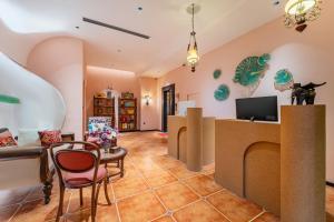 Sjónvarps- og/eða afþreyingartæki á Chaozhou Fanhuali B&B