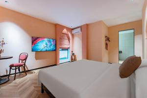 Sjónvarps- og/eða afþreyingartæki á Chaozhou Fanhuali B&B