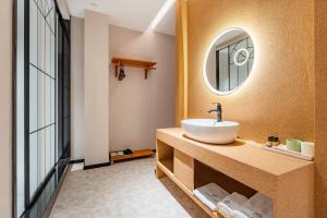 Koupelna v ubytování Chaozhou Fanhuali B&B + 37 fotografií
