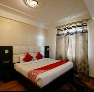 Postel nebo postele na pokoji v ubytování Hotel The Golden Paradise + 21 fotografií