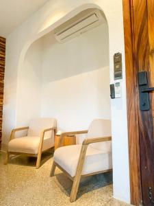 Posezení v ubytování La Grotta Hotel - Phu Quoc Emerald Bay