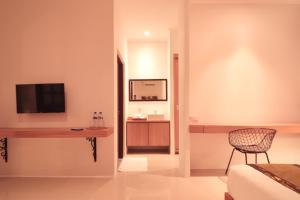 TV a/nebo společenská místnost v ubytování Amaya Residence Jimbaran