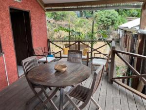 Balkón nebo terasa v ubytování La Bananeraie Apt 35m2 piscine jardin tropical parking privé