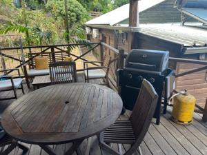 Balkón nebo terasa v ubytování La Bananeraie Apt 35m2 piscine jardin tropical parking privé