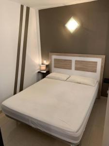 Posteľ alebo postele v izbe v ubytovaní AwayDays Apartamento en la 7a planta vista mar