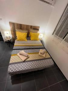 Postel nebo postele na pokoji v ubytování Appt Corail au pied du Lagon St Leu - 6 pers