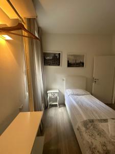 Albergo del Pozzo客房内的一张或多张床位