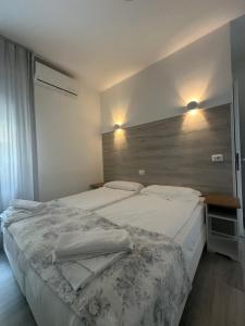 Albergo del Pozzo客房内的一张或多张床位