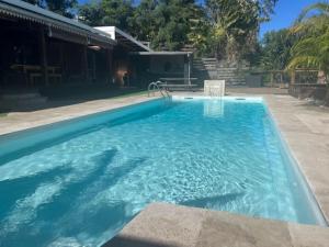 Bazén v ubytování La Bananeraie Apt 35m2 piscine jardin tropical parking privé nebo v jeho okolí