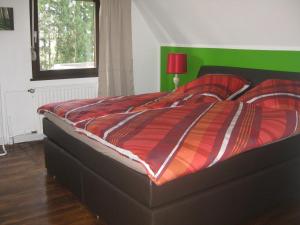 Postel nebo postele na pokoji v ubytování Ferienhaus Dell