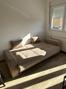 Postel nebo postele na pokoji v ubytování MM-2 Apartman