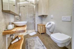 Ένα μπάνιο στο Apartment Heinz +15 φωτογραφίες